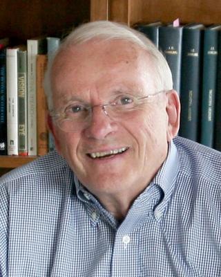 Prof John E. Dowling